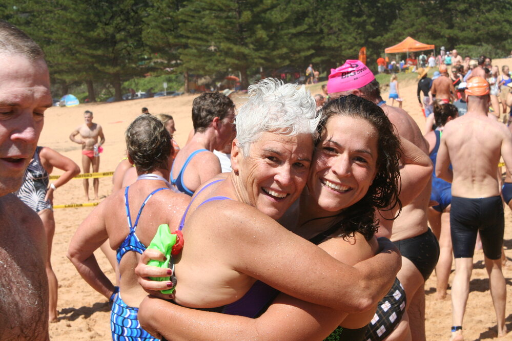 Competitors in the Big Swim finish at Whale Beach