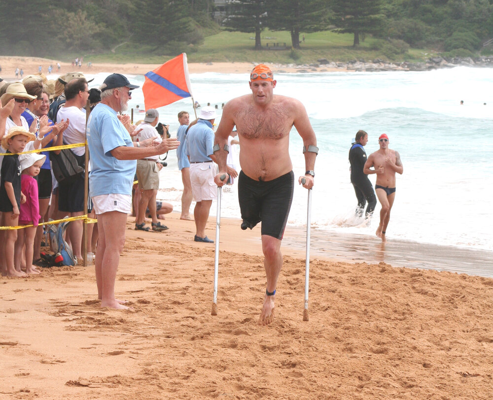 Marc Radatt finishing the 'Big Swim' Whale Beach