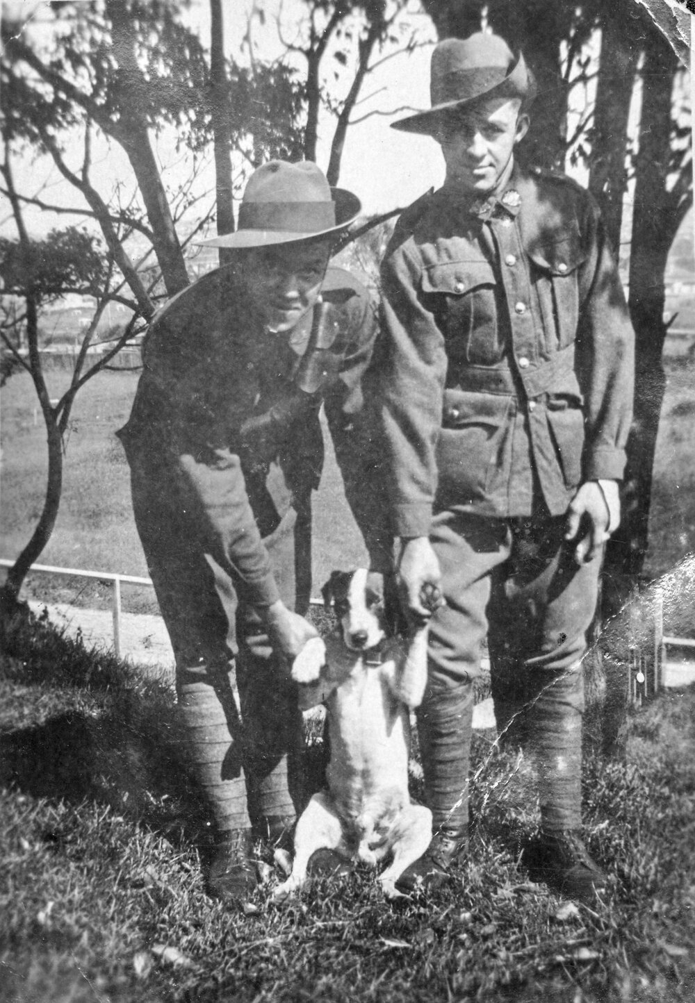 Charles and Robert Goodwin, with their dog, Manly Oval