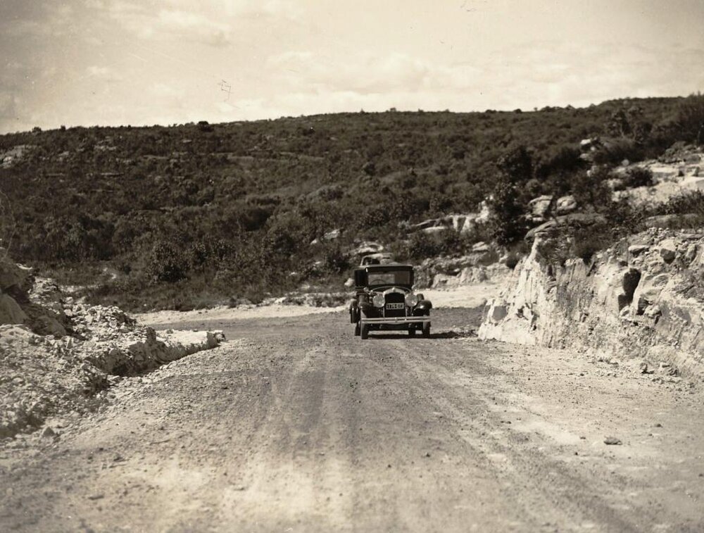 Car in Ernest Street at junction of Condamine Street with rocky siding, Balgowlah, 5th September 1935