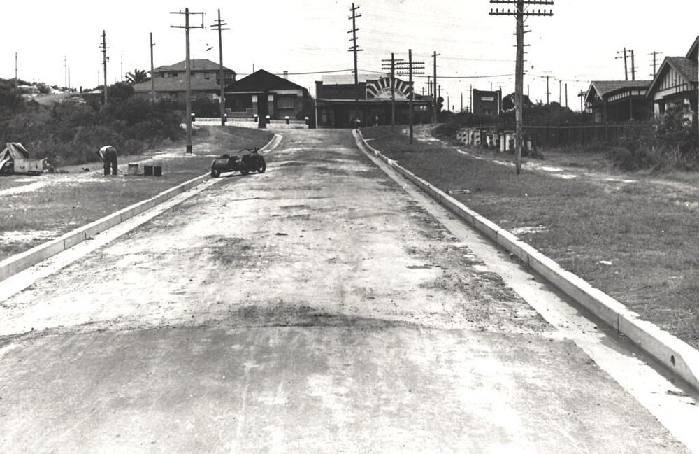 Man reviewing verge on Dudley Street near Sydney Road, Seaforth, 26th January 1939