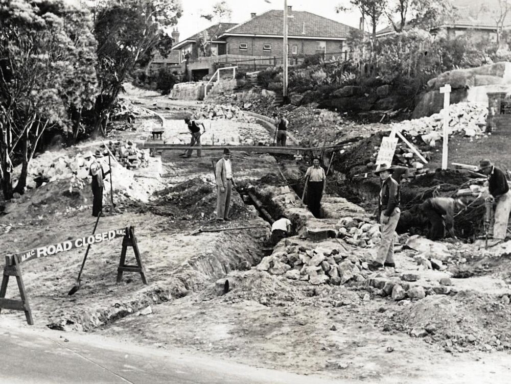 Edgecliffe Esplanade at Palmerston Place construction works continue, Seaforth, 20th June 1947