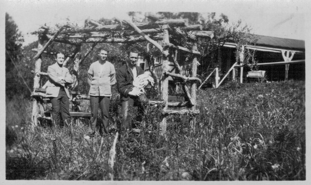 Members of the Douglas family standing in the garden of their Mona Street house, Mona Vale