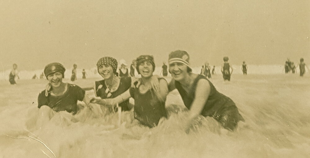 Hilda Kelly and friends playing in the water at Newport Beach