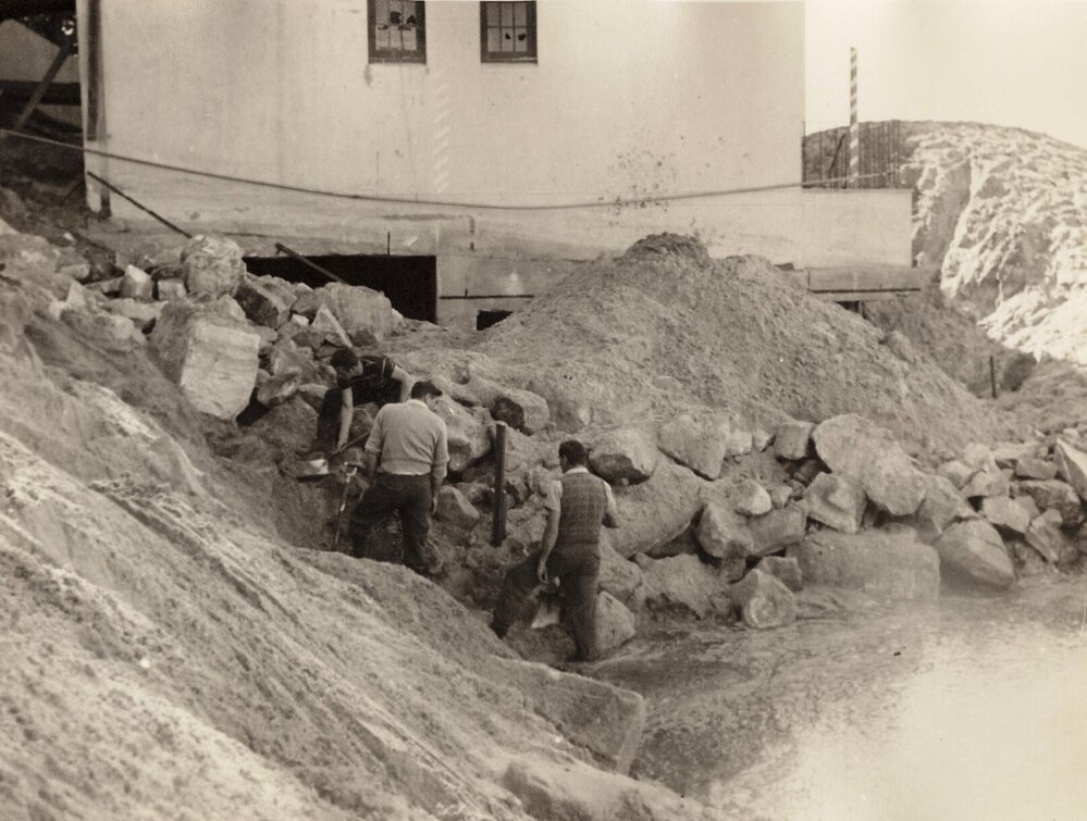 Men working on clearing sand after a strom, North Steyne Surf Life Saving Club, Manly, 1955