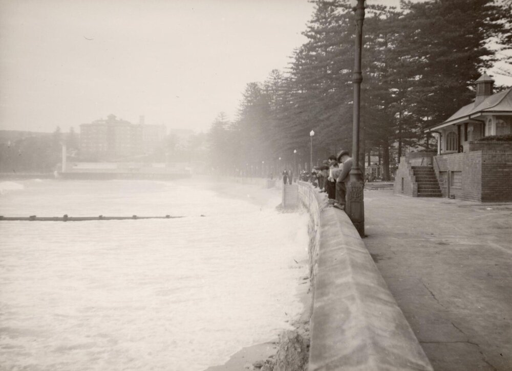 Ocean beach, showing toilet block, Manly, 19th July 1950
