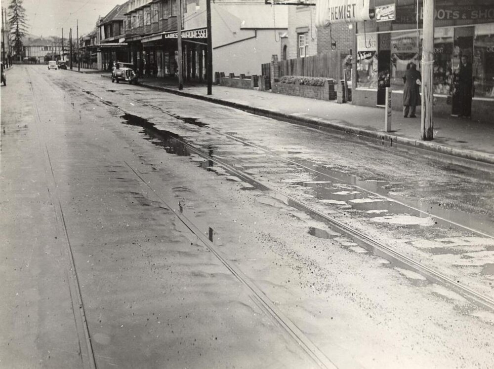Pittwater Road Chemist and ladies hairdresser, with tramways, Manly, 27th April 1940