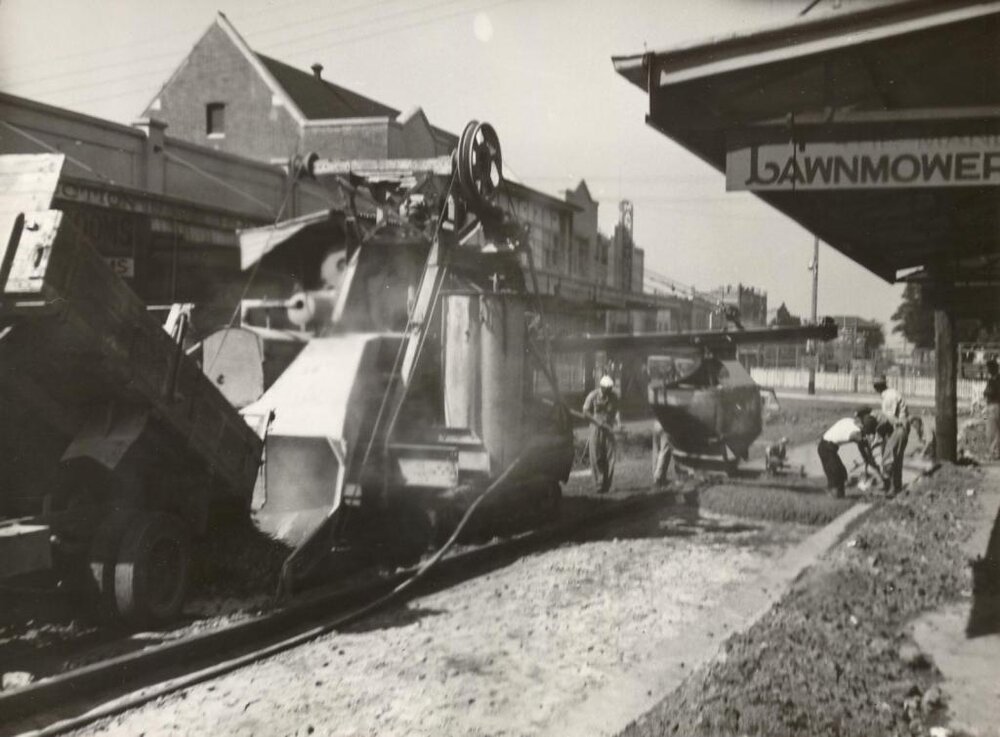 Pittwater Road with work crew pouring concreting, Manly, 24th September 1949