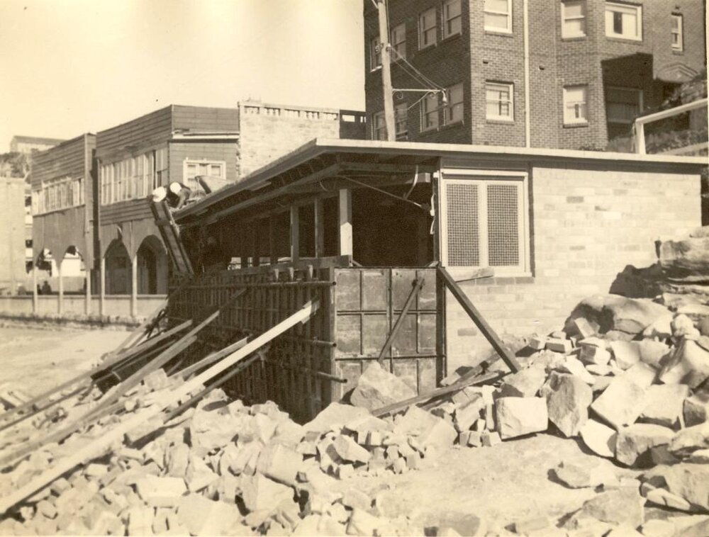 Restoration of Fairy Bower boatshed after storm damage, Manly, 1955