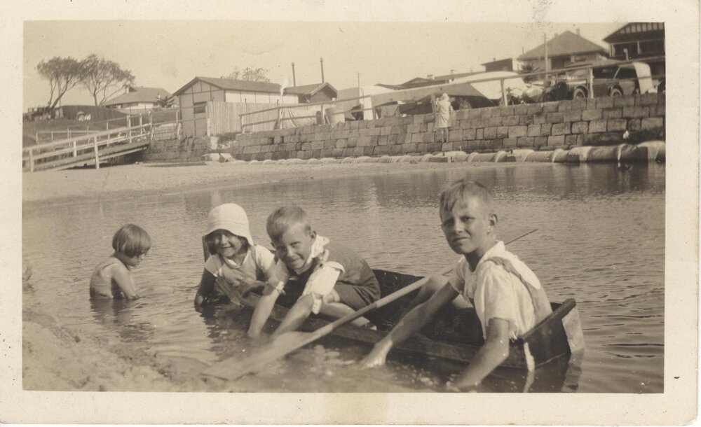 Kingsley and Starr children in Canoe at Collaroy Beach