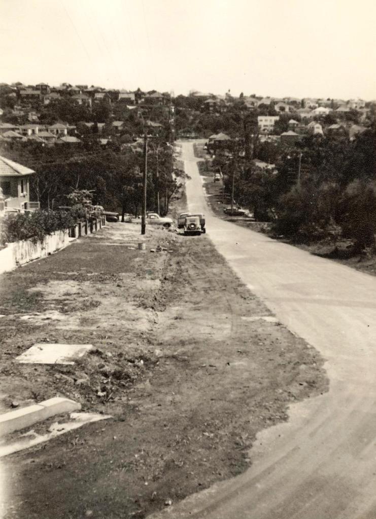 Unidentified street with rough edge and steep incline, c1940s
