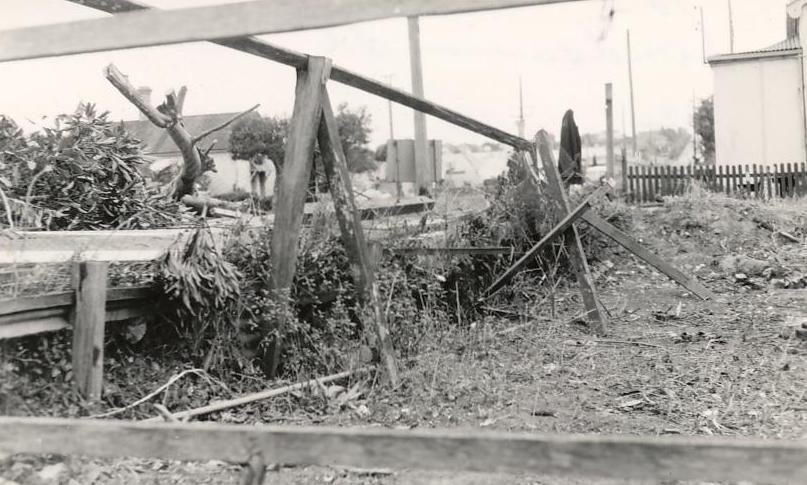 Timber supports in cleared area or garden, c1940s