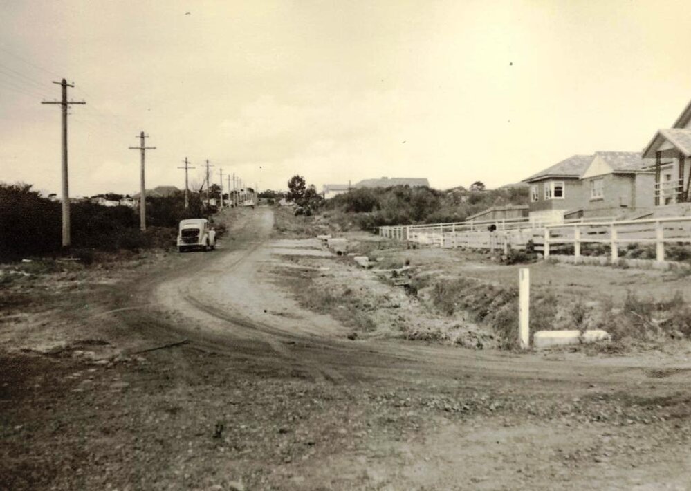 Roadworks continue on an unidentified unsealed road, c1940s