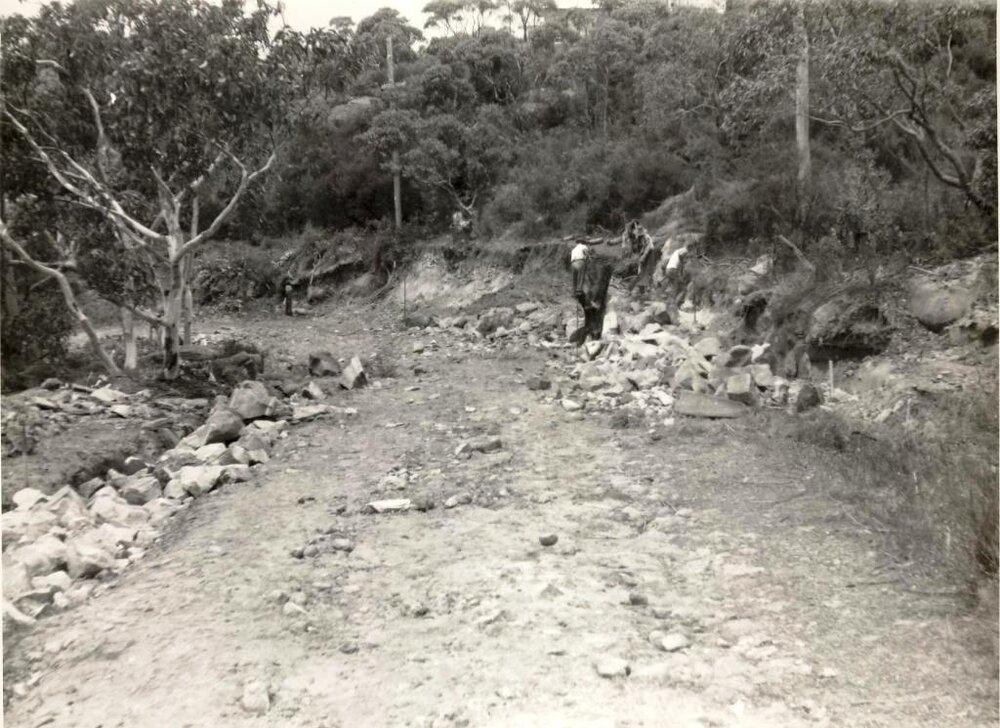 Construction workers continue with roadworks, c1940s