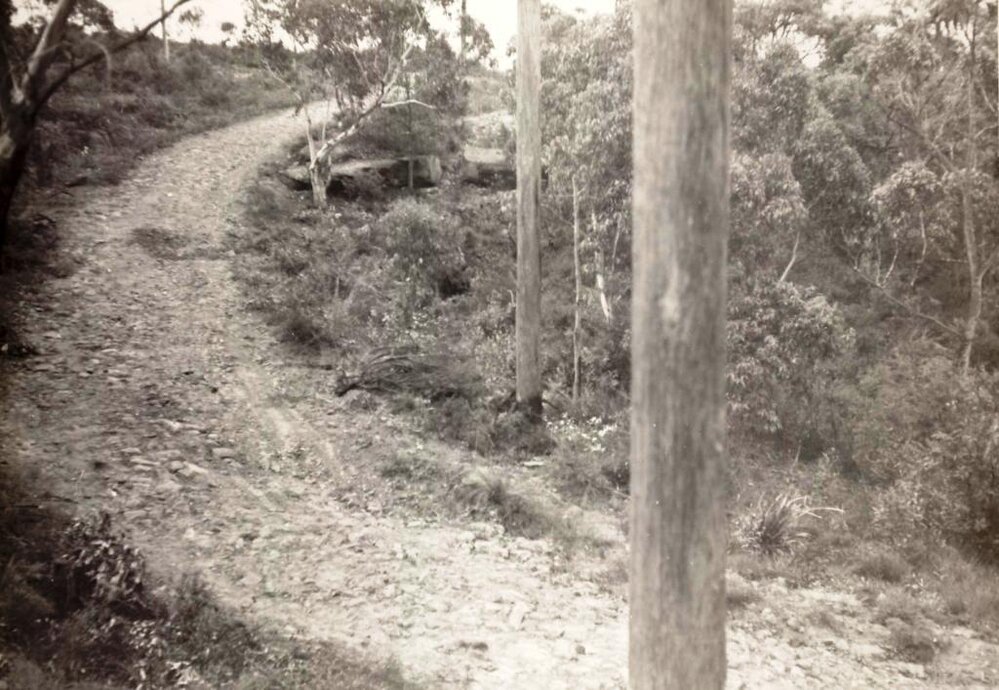 Steep rocky unsealed road surface, c1940s