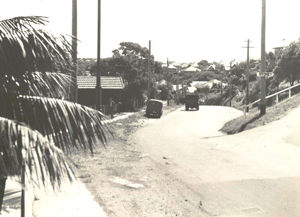 Unidentified street intersection with road sign reading, Sydney, c1940s
