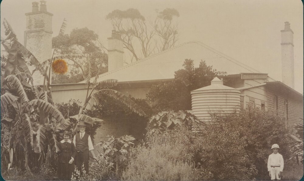 Robert Harper, unknown boy and Hannah Harper in front of Back of Teachers Residence, Newport, c1906