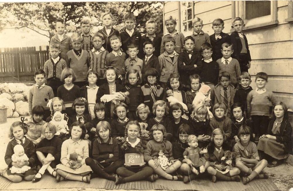 School pupils of the Garden School, Wanganella Street, Ruth Hutchin holding slate, Balgowlah NSW 2093, c1930s