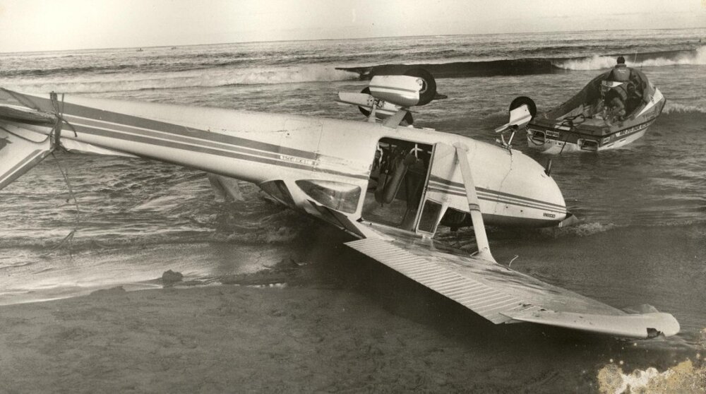Overturned light aircraft, local beach, c1982
