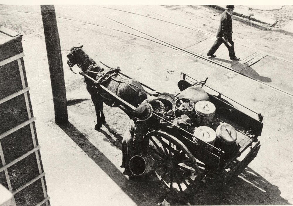 Garbage collector's wife, garbage cart, tramlines