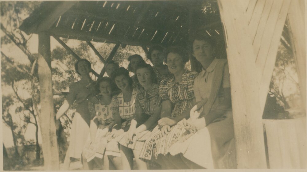 Nine Women Sitting Under a Shelter, Narrabeen, 1943