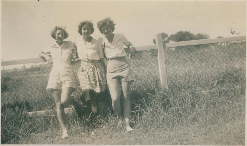 Three women at a fence, Narrabeen, 1943