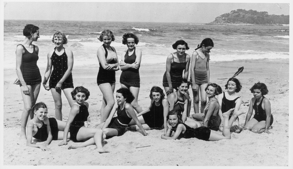 Group of girls from Manly Grammar School posing on Manly Beach, Manly, c1930