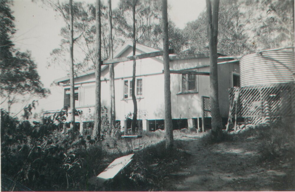 Gill Family Home showing large water tank at back, Scotland Island