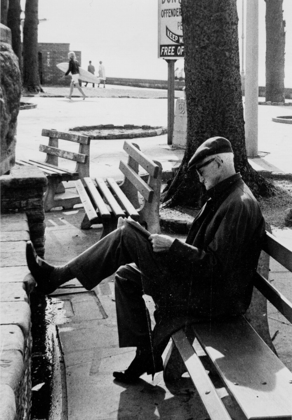 Elderly gentlemen sitting on wooden bench near Manly Beach, Manly, c1967-1973