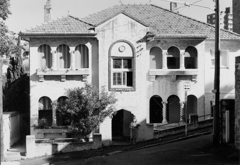 Parkland building on sloping street, Manly, c1967-1973