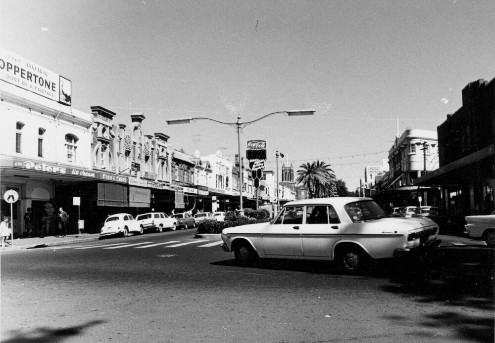 White car turning into The Corso, Manly, c1967&ndash;1973