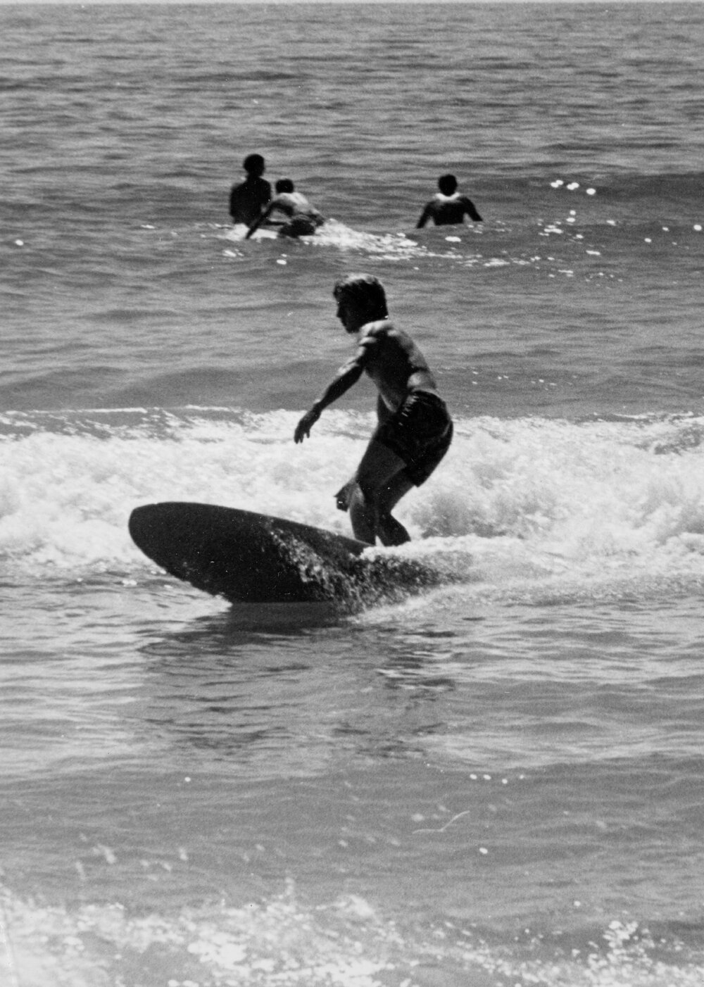 Surfer on a small wave at Manly Beach, Manly, 1972