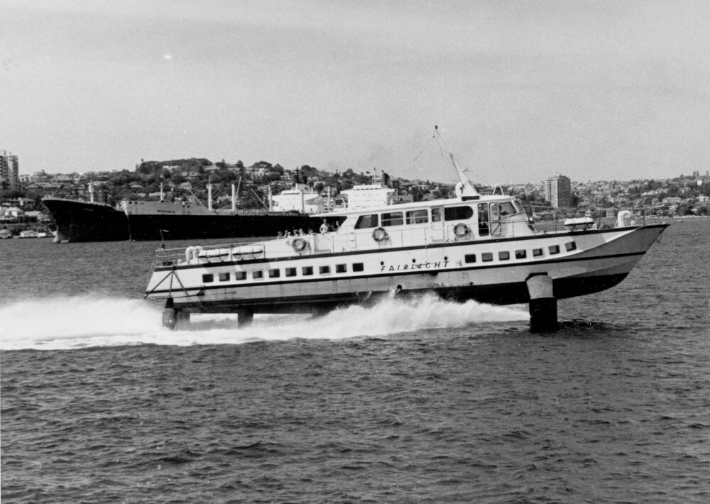 Fairlight hydrofoil passing a cargo ship on the harbour, Manly, c1967&ndash;1973 