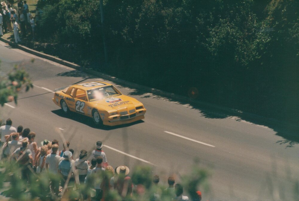 Race car on Sydney Road during Seaforth Motor Race, Seaforth, 1987