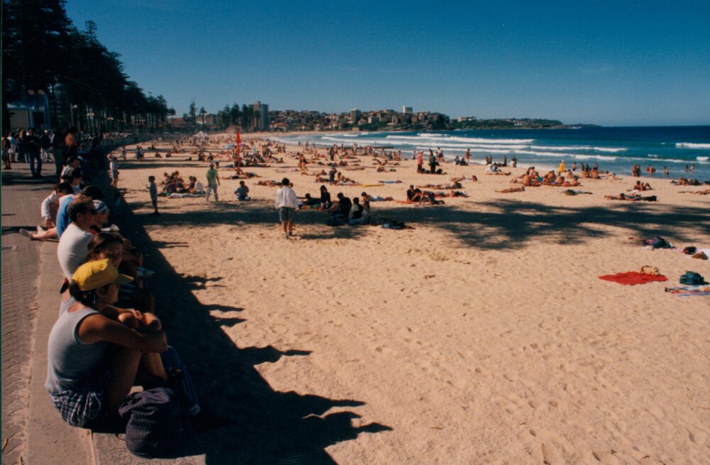 People along the promenade wall at Manly Beach, Manly, 1997