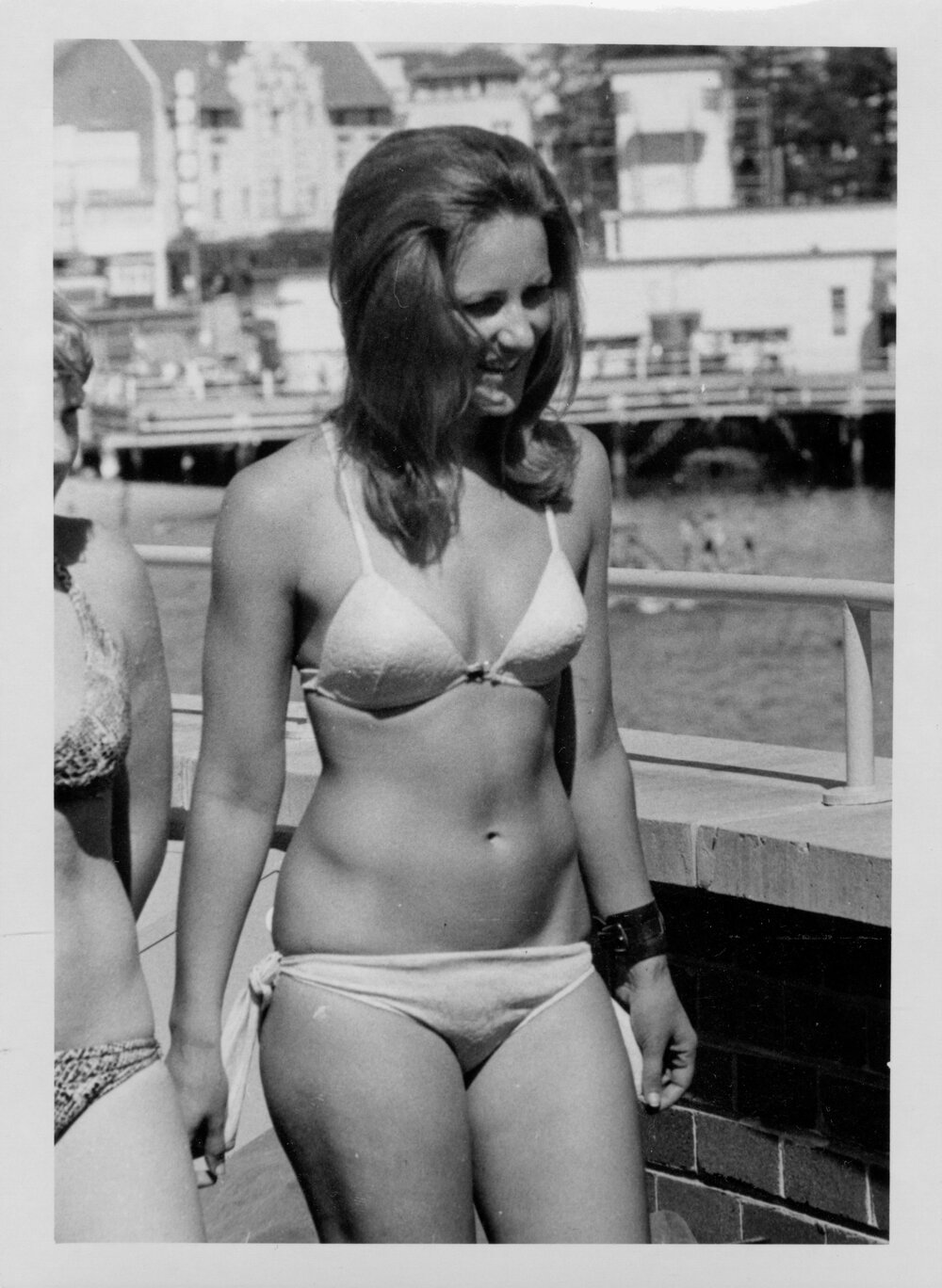 Lady in swimwear atop the Many Aquarium, Manly, c1967-1973