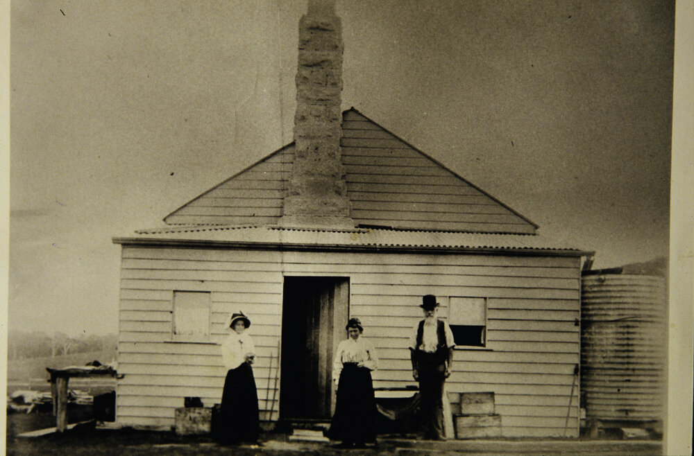 Johnny Farrell and his wife Rose outside of their renovated home with another lady, Newport, 1909