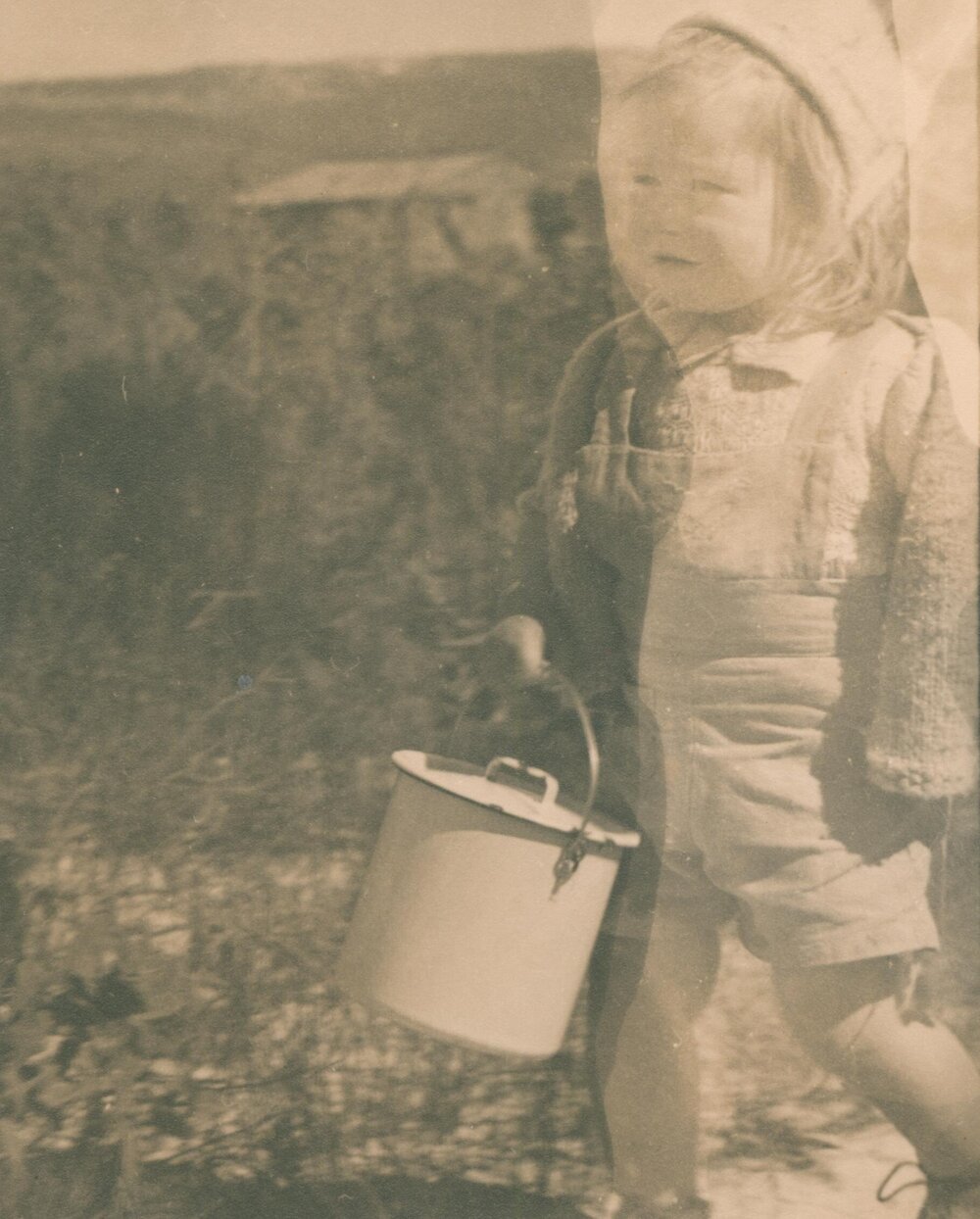 Jenny van der Pot with milk billy, Boomerang Road, Collaroy Plateau, c1946