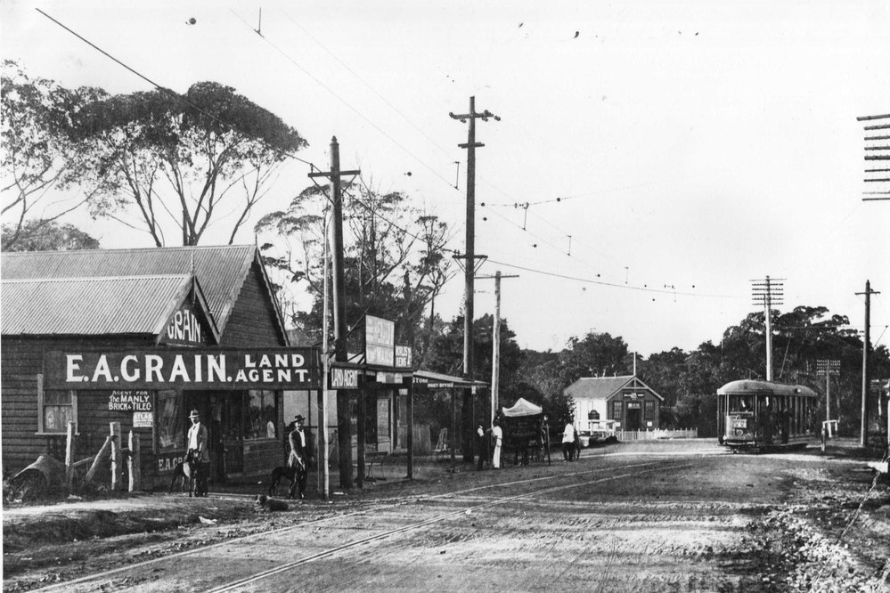 Pittwater Road Dee Why showing E.A Grain Land Agent and Tram
