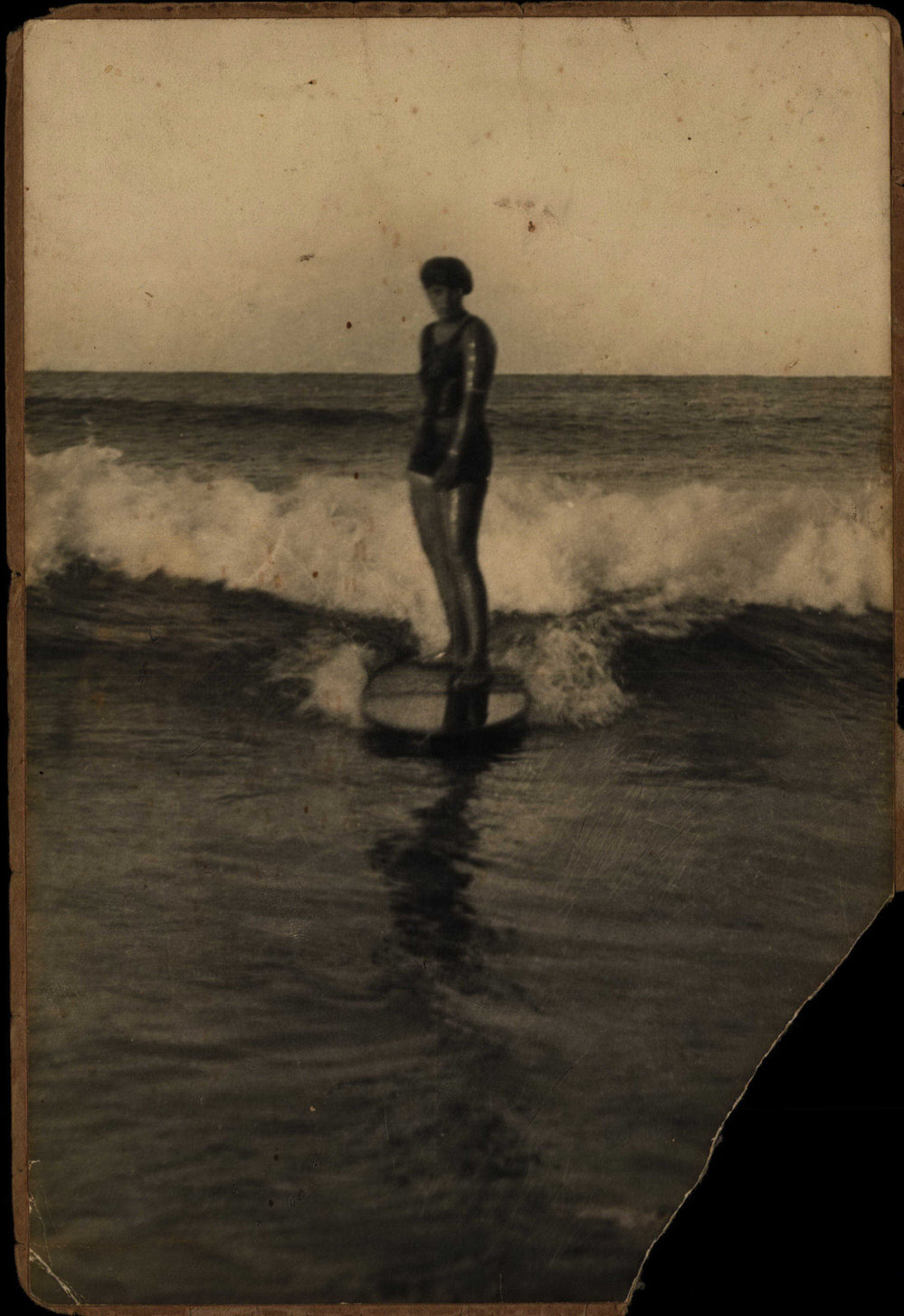 Isabel Letham riding a surfboard at South Steyne