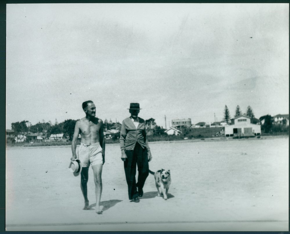 John Henry Herwig (Jack) walking on a dry Narrabeen Lake bed, with his father John Phillip Herwig and dog