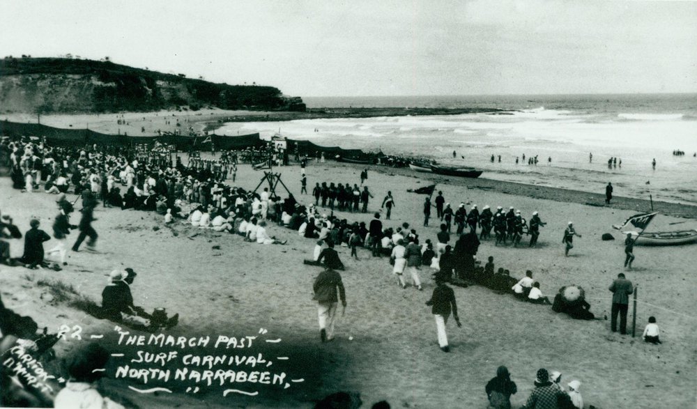 Surf carnival march-past at North Narrabeen Beach