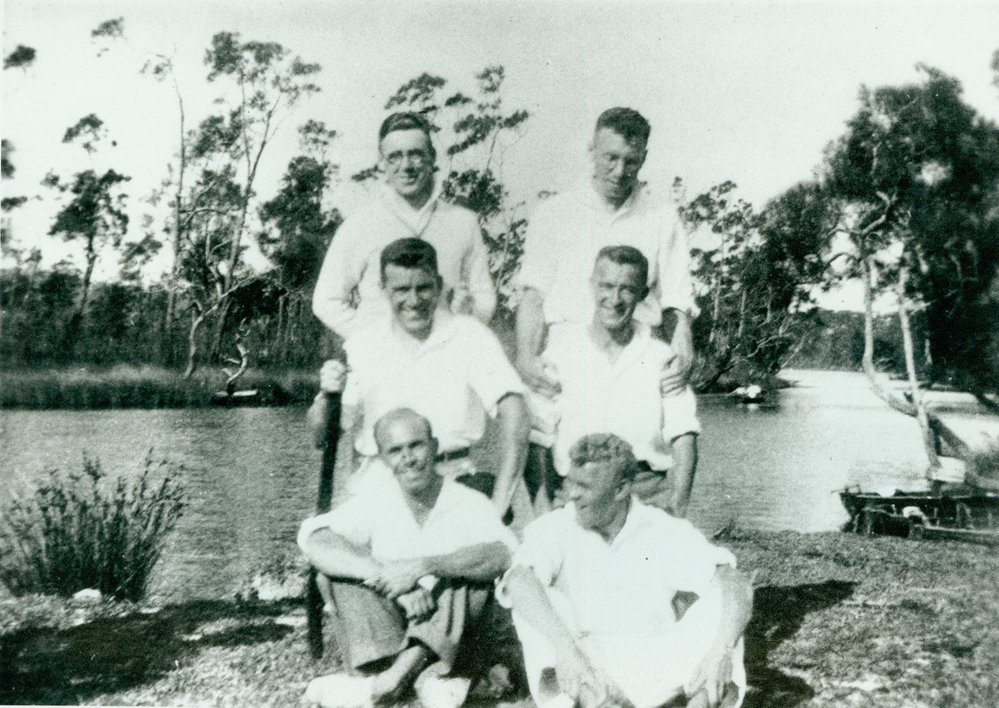 Group of men boating at Narrabeen Lagoon