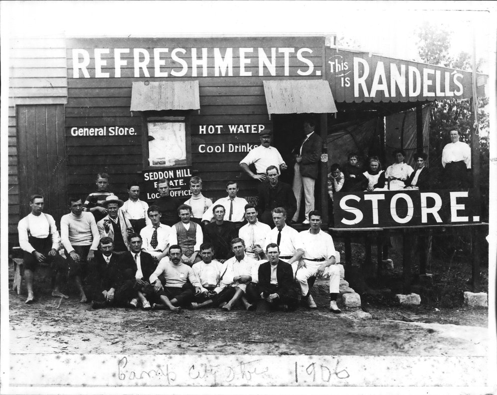 Holidaymakers outside Randell's store, Harbord