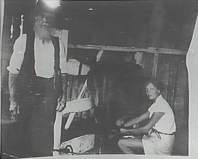 Johnny Farrell, in the bails with a young helper, Newport