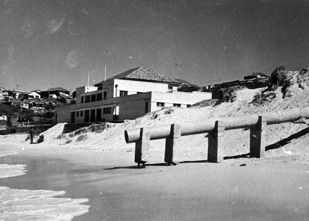 South Curl Curl Surf Life Saving Club with storm water pipe in foreground