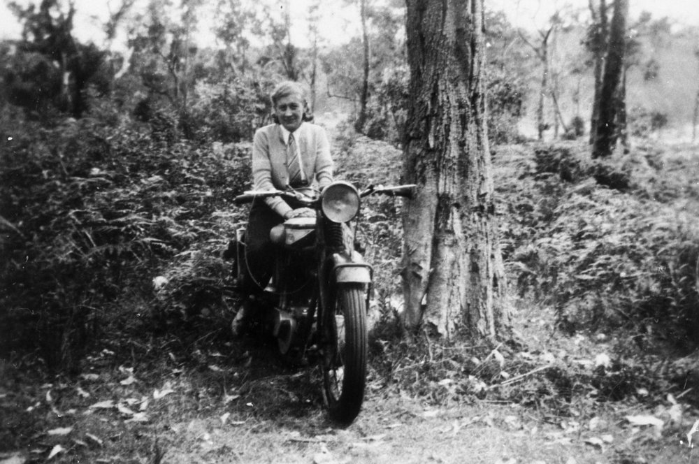 Edna Monk on a motorcycle at Palm Beach