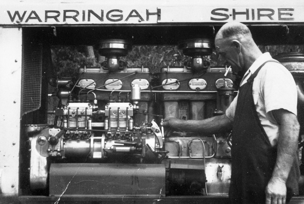 Harry Brodie with compressor to drive a jackhammer, Warringah Shire Council