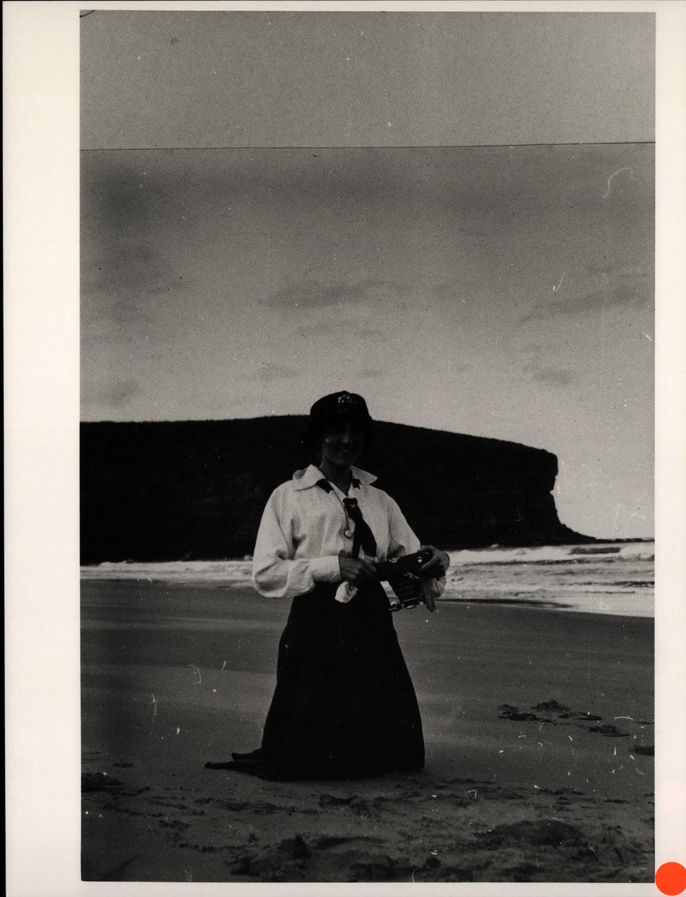 Miss Cadman on Bilgola Beach with camera