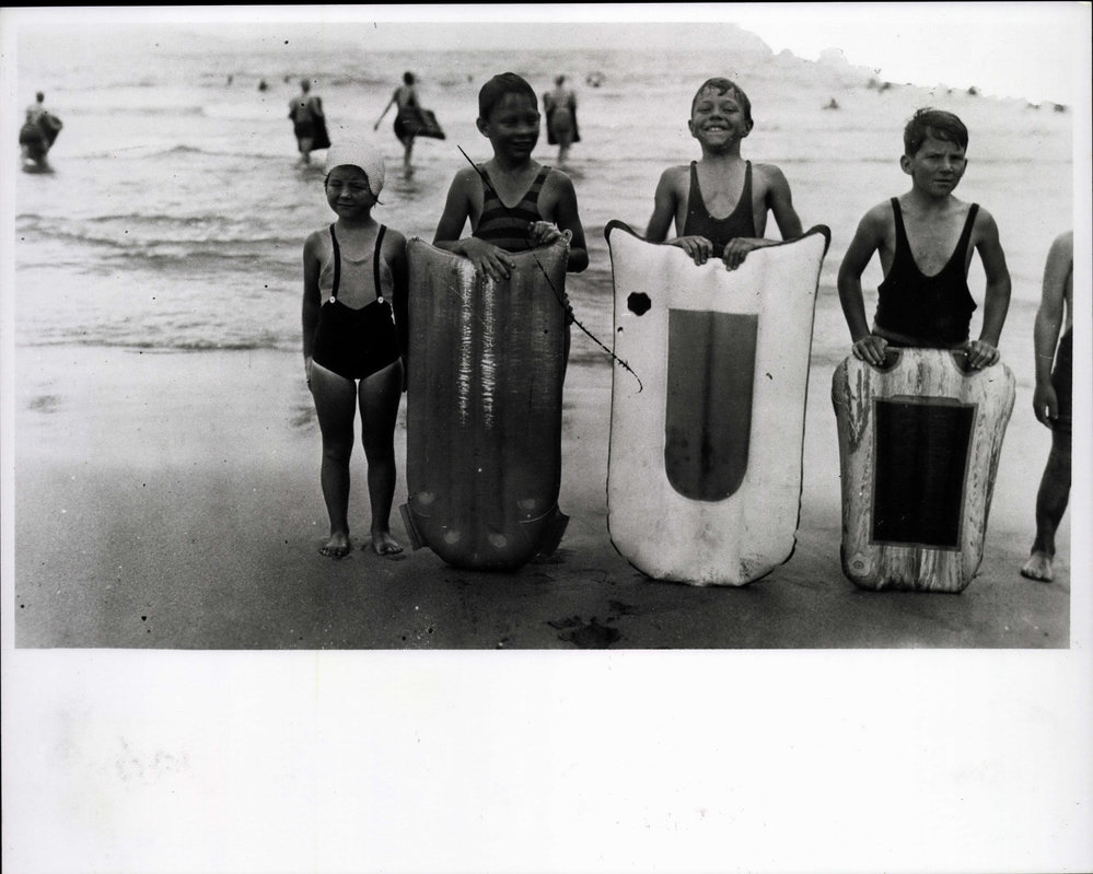 Children with surfoplanes Palm Beach